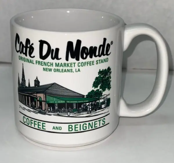 https://shop.cafedumonde.com/wp-content/uploads/2014/12/NEW-LARGE-LOGO-MUG-FRONT-600x563.jpg.webp