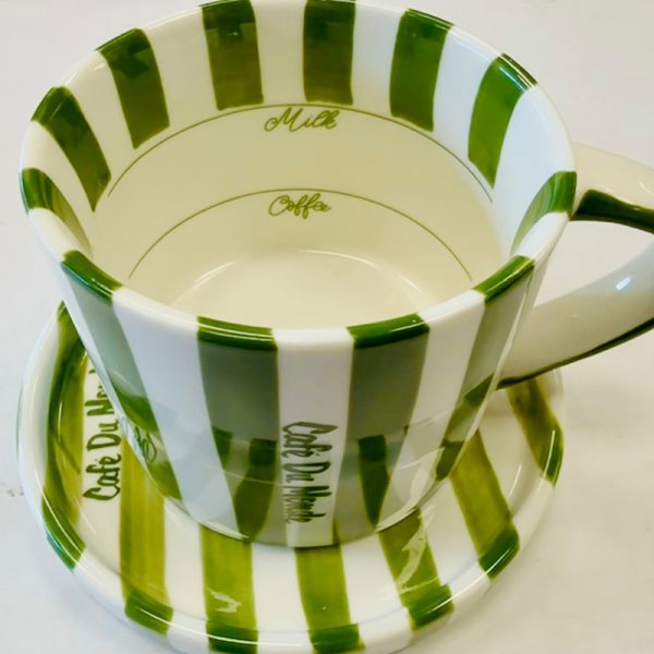 Cluseup view of Cafe du Monde Green Cup and Saucer