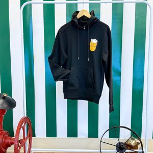 Cafe du Monde Jet Black Hoodie with Coffee Can hung up