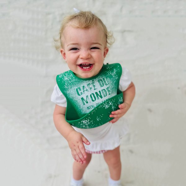 Lane wearing the Cafe du Monde Silicone Bib