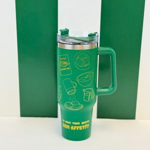 Cafe du Monde Recipe Tumbler in Green and Gold saying Un Duex Trois Quatre Bon Appetit